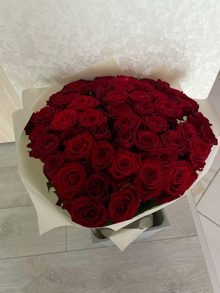 Professional floral arrangement in modern corporate setting